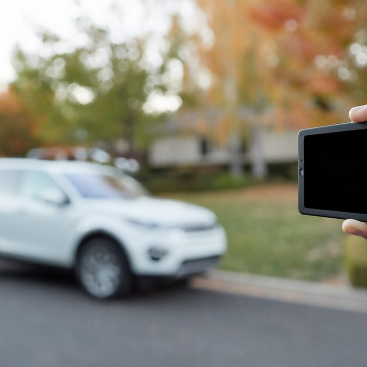 owl car cam in hand