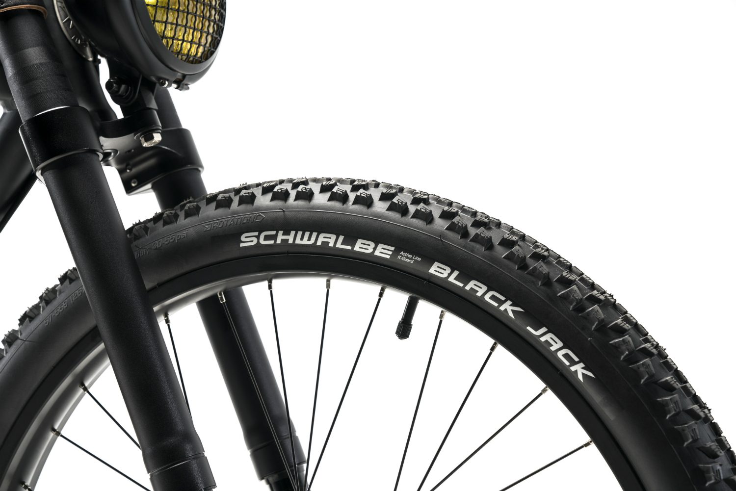vintage electric scrambler s ebike black front tire logo
