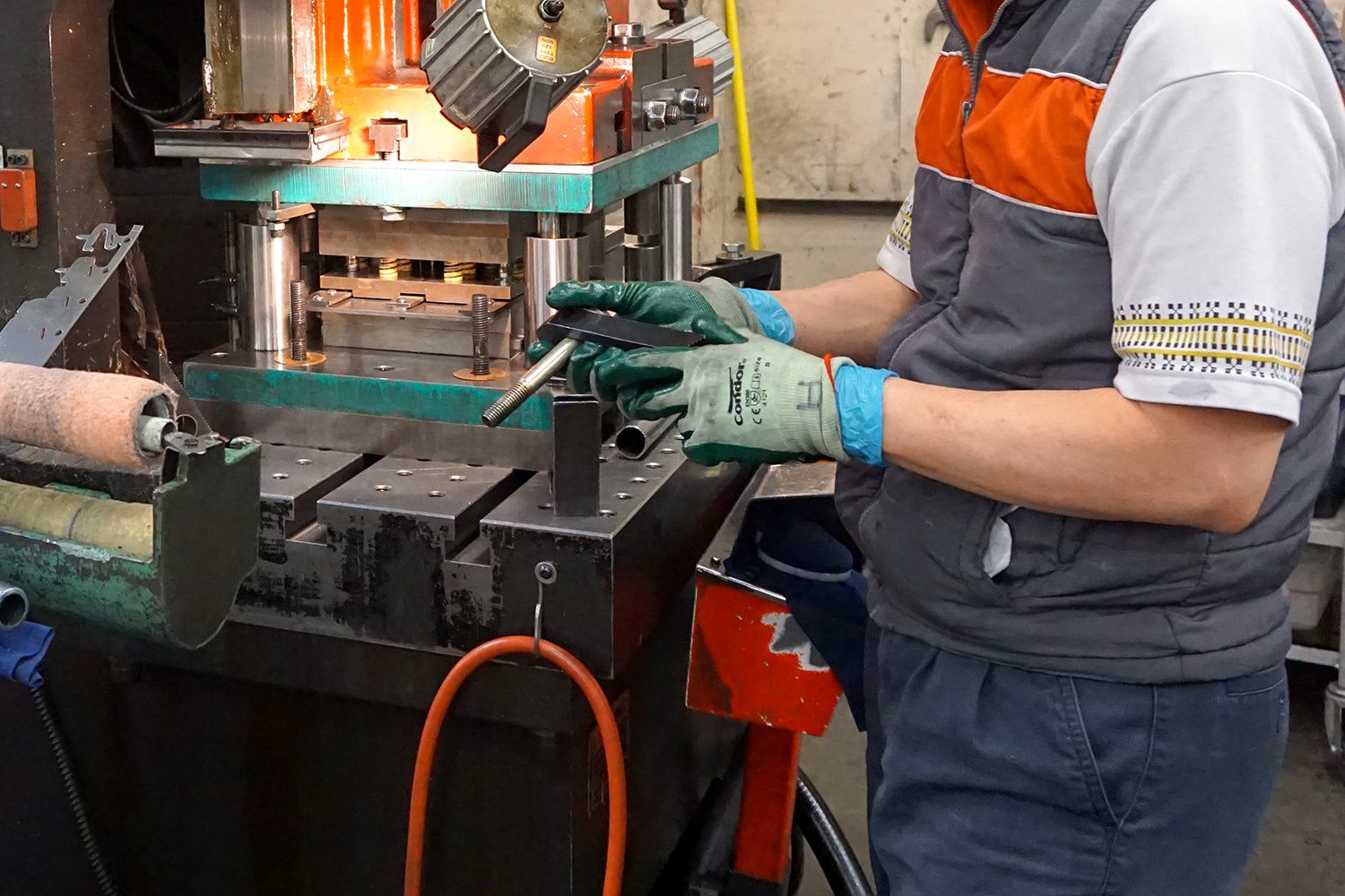 MSR factory tour worker with gloves