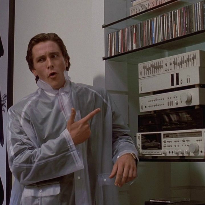 Patrick Bateman pointing to a stereo in "American Psycho."