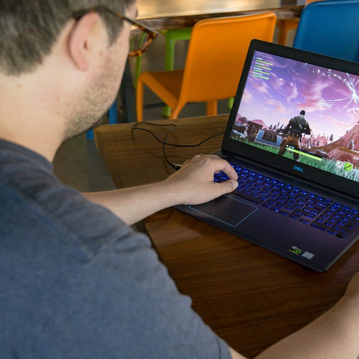Playing Fortnite on a laptop