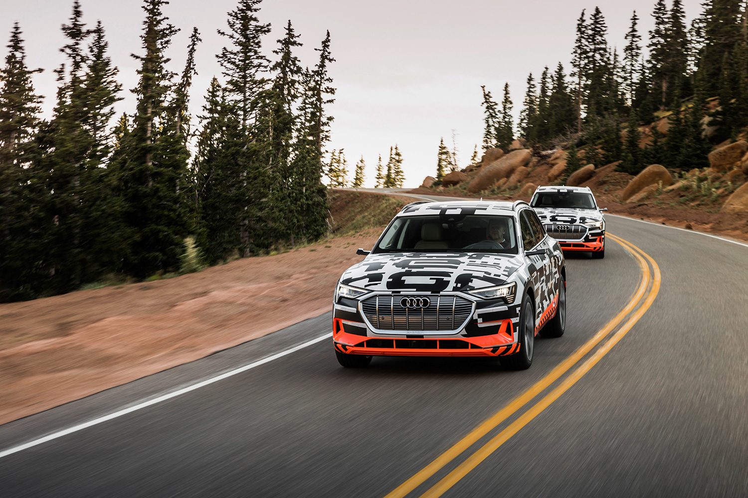 Audi E-Tron Electric SUV two cars front