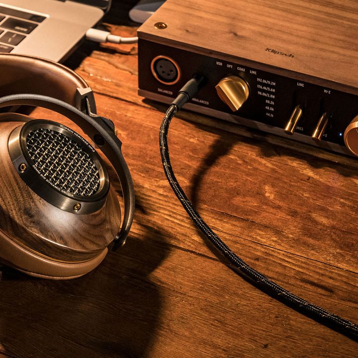 Headphones connected to headphone amp.