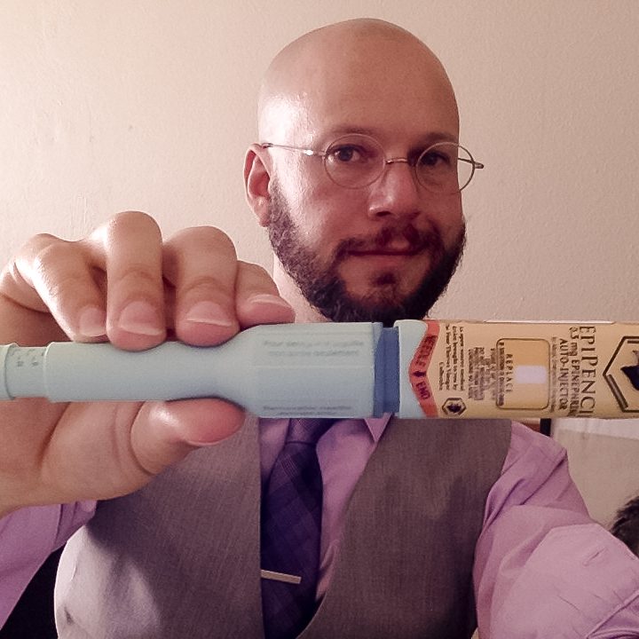 Dr. Mixael Laufer holding an EpiPencil
