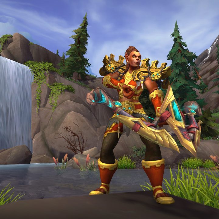 A warrior stands in front of a waterfall in World of Warcraft: Battle for Azeroth.