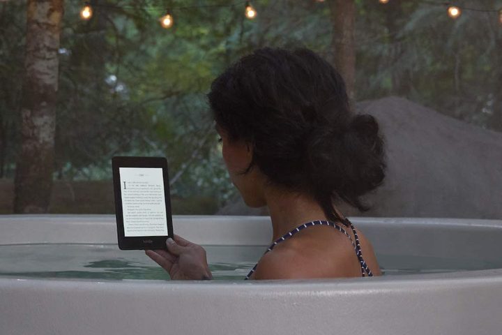 The Kindle Paperwhite being read in a bath.
