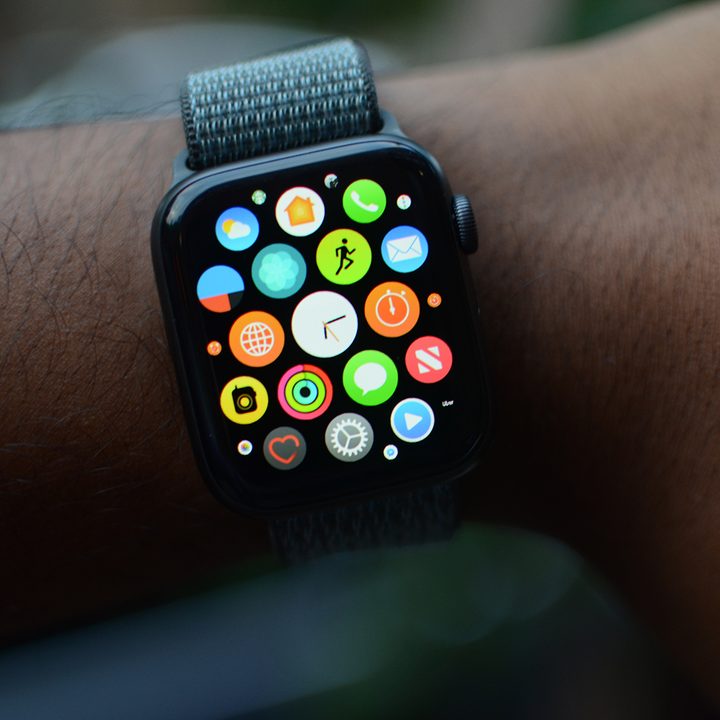 Apple Watch Series 4 home screen on wrist.