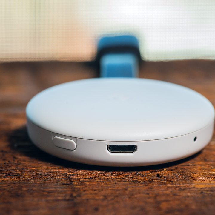 Chromecast 3rd Gen sitting on a table.