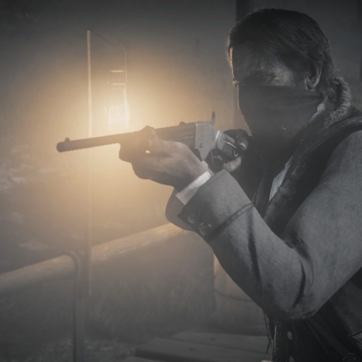 Character holding a rifle in Red Dead Redemption 2.