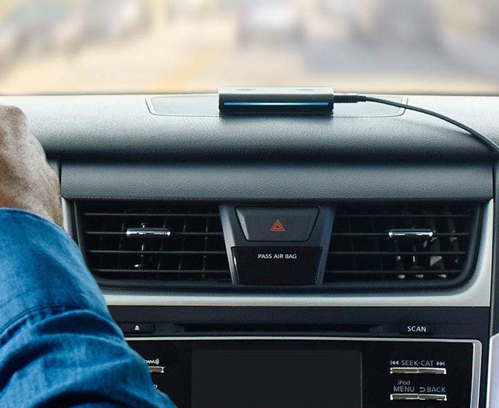 Amazon Echo Auto installed in a car dashboard adds Alexa.
