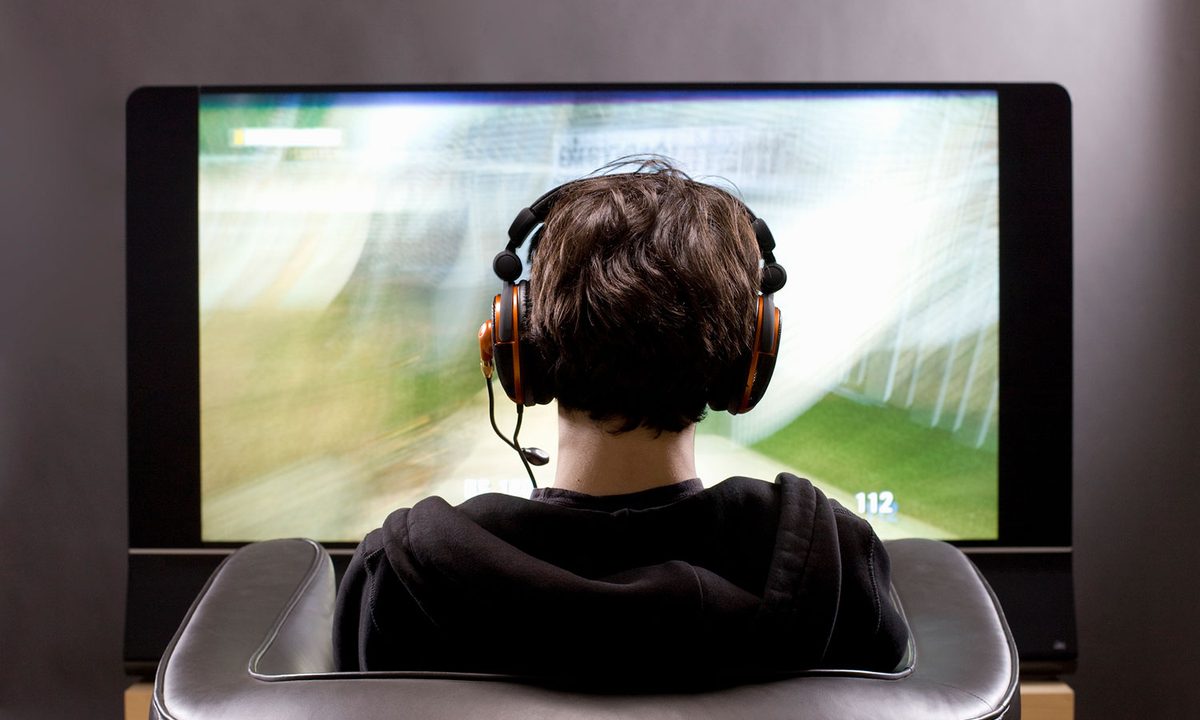 Person wearing gaming headset.