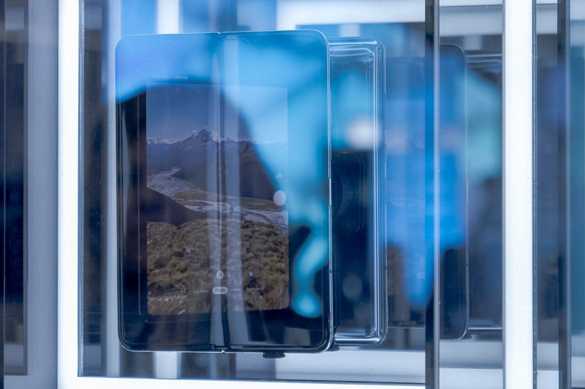 Samsung Galaxy Fold behind a glass case at Mobile World Congress