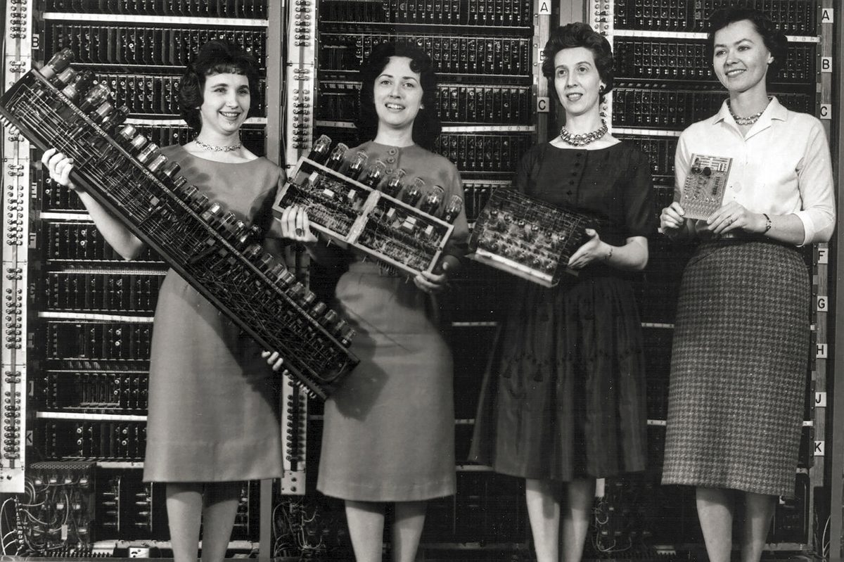Patsy Simmers, holding ENIAC board; Gail Taylor, holding EDVAC board; Milly Beck, holding ORDVAC board; and Norma Stec, holding BRLESC-I board.