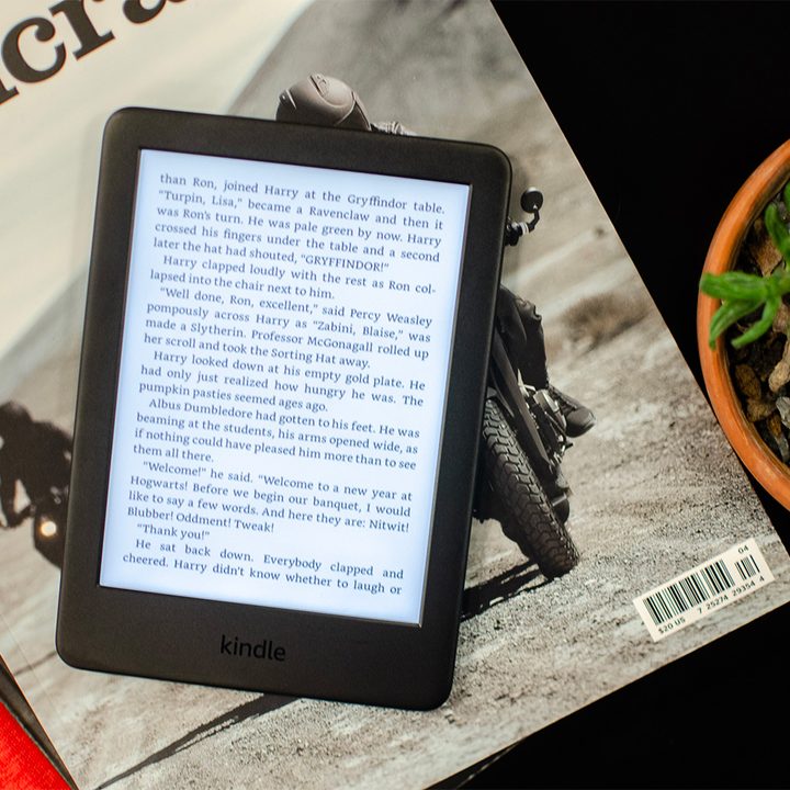 An Amazon Kindle displayed on a coffee table.