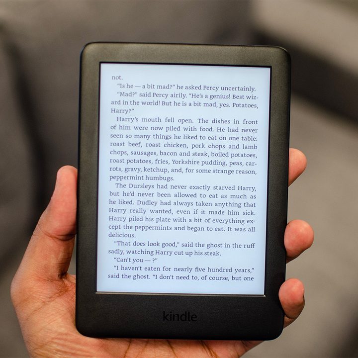 The 2019 Amazon Kindle in the hands of a reader.
