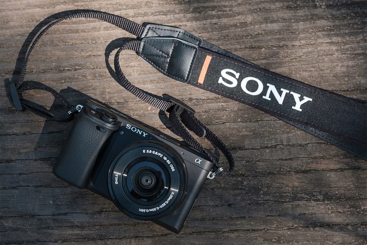 The Sony a6400 camera and lens on a table.