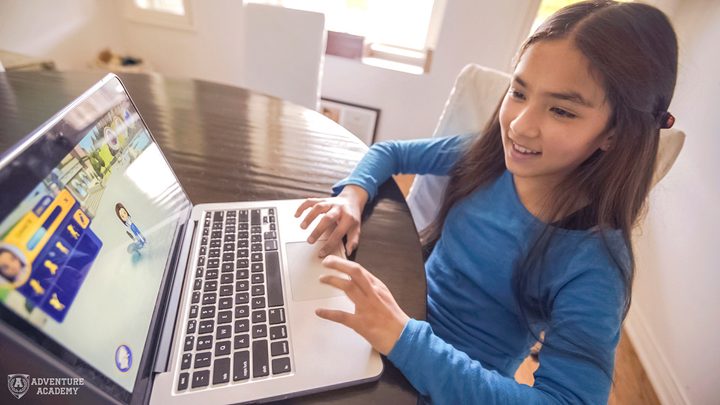 Girl playing Adventure Acadamy