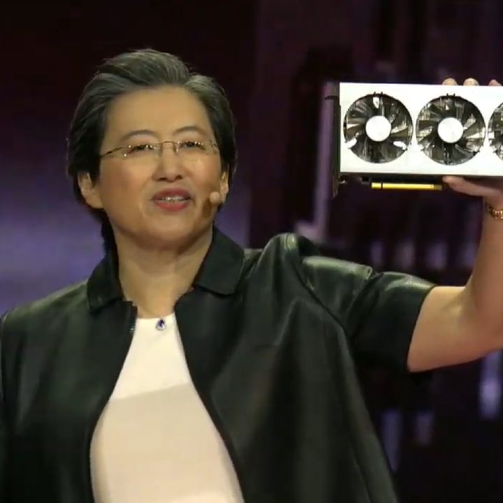 AMD CEO Lisa Su holding a graphics card.