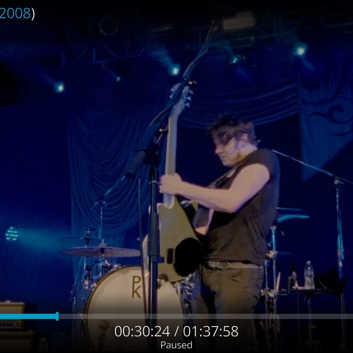 The Kodi interface with a music video playing.