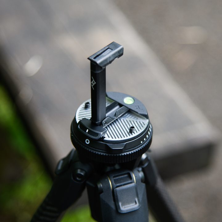 The Peak Design Travel Tripod has a clever phone mount.