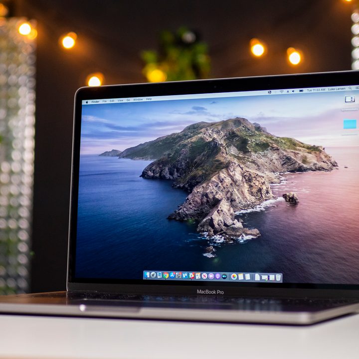 A MacBook Pro with MacOS Catalina sitting on a table.