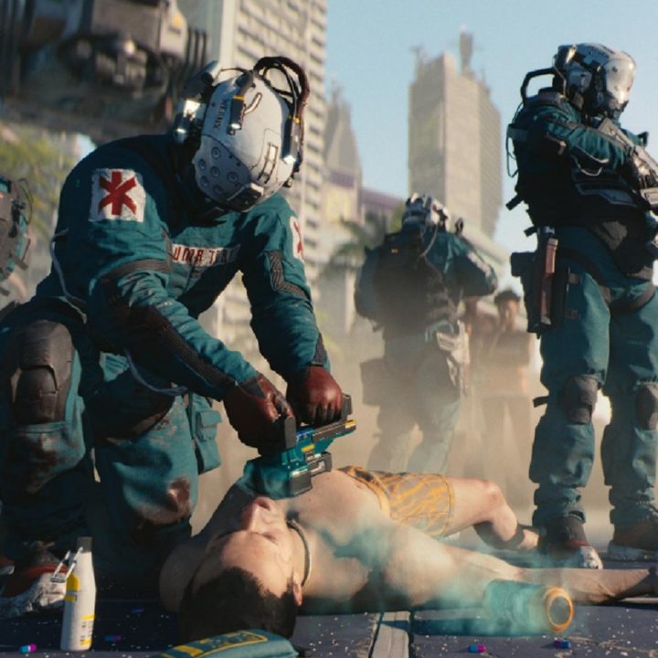 A medic defibrilating a man.