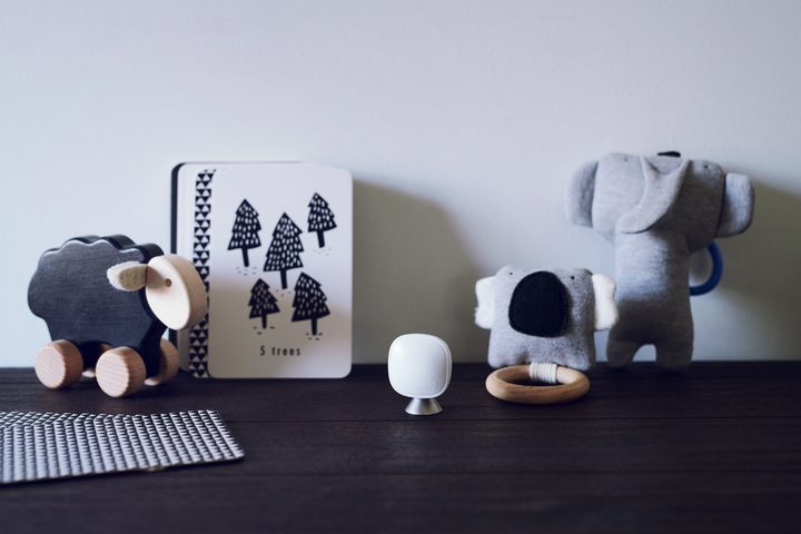 An Ecobee sensor on a table.
