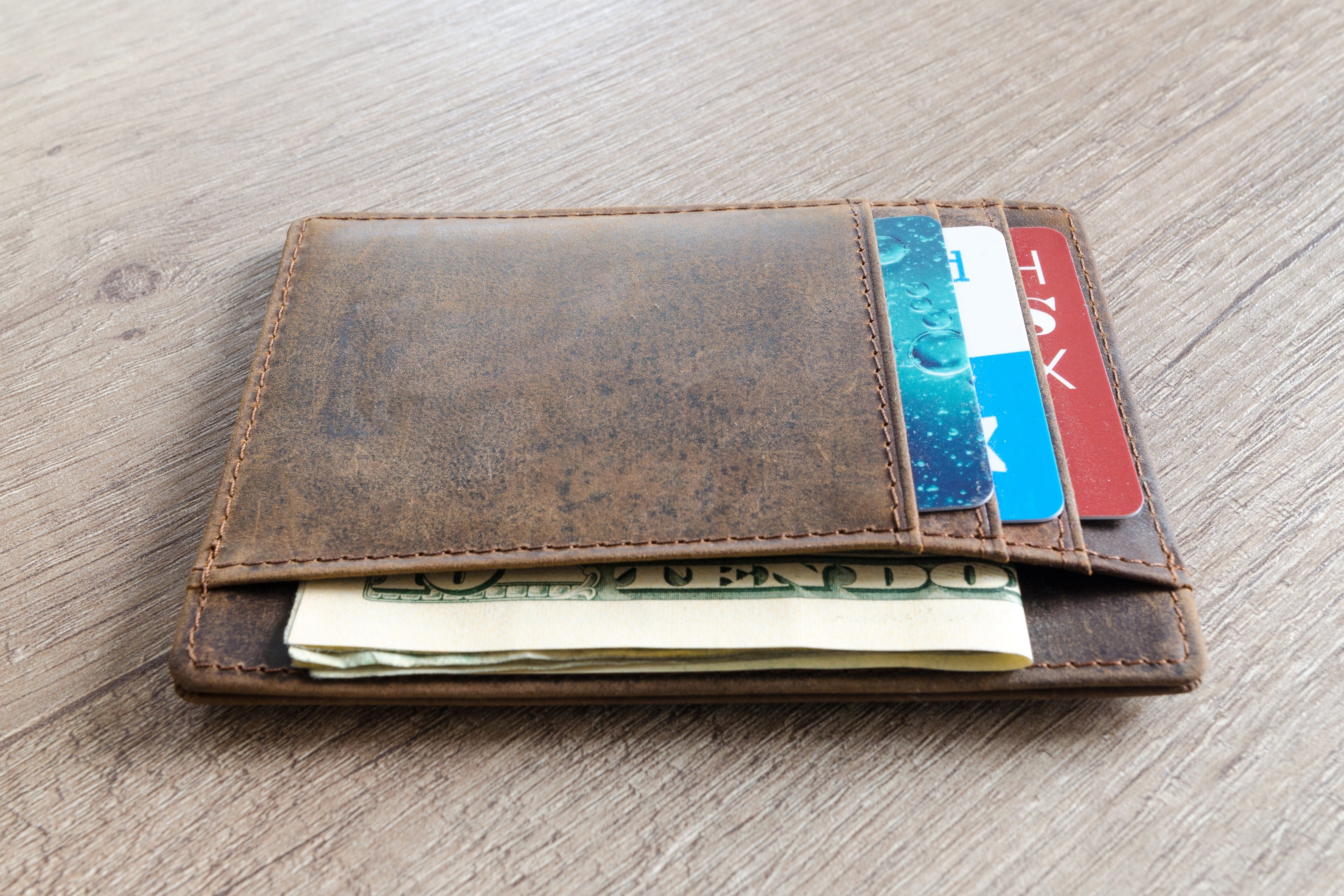 wallet with cash and cards