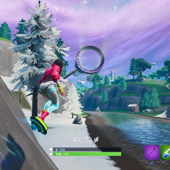 Player hoverboarding in Fortnite.
