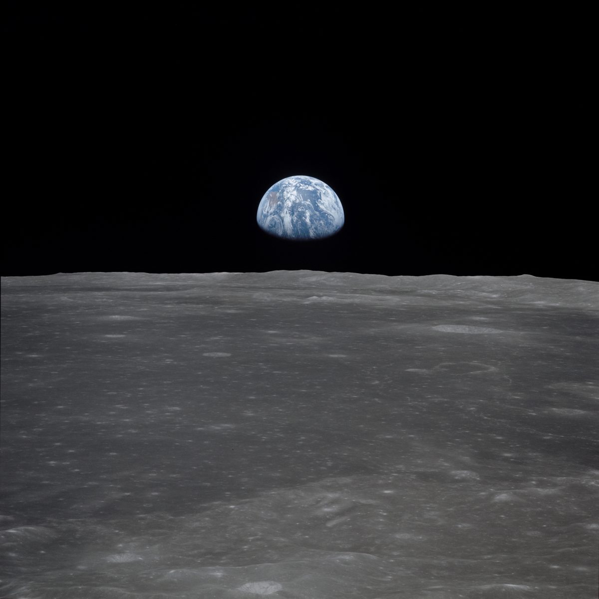 Earth Rise photo on the moon by NASA taken on a Hasselblad camera during the Apollo missions