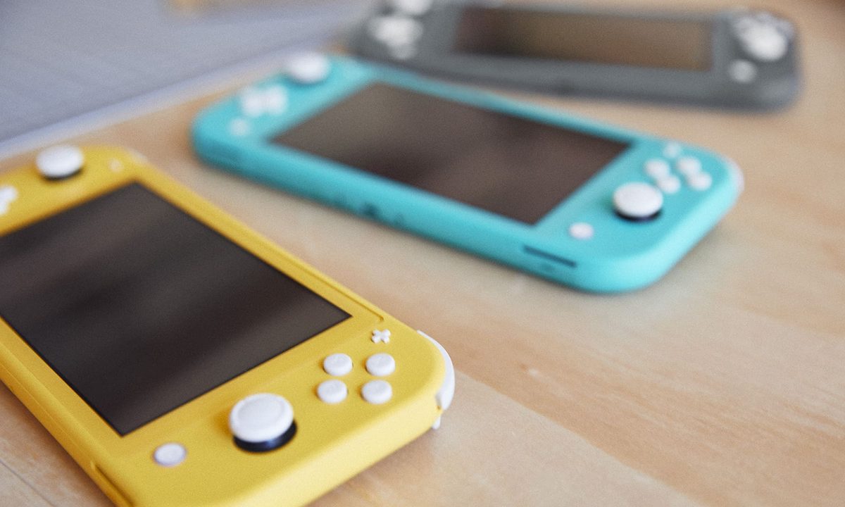 Three Nintendo Switch Lite systems next to each other.