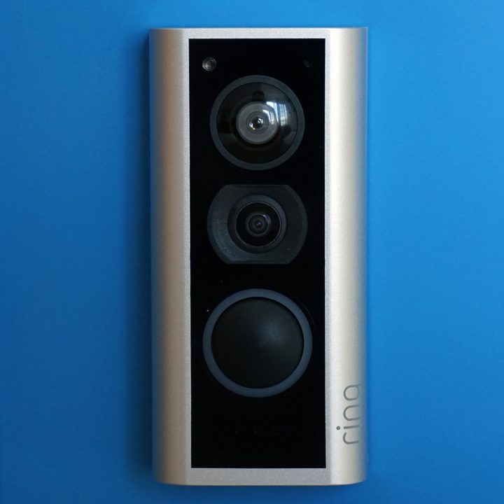 Ring Peephole Cam on a blue door.