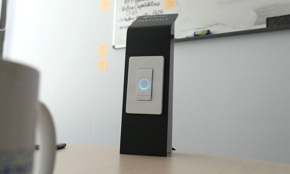 The iDevices Instinct on a desk.