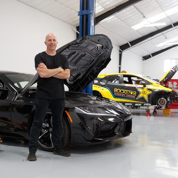 Stephan Papadakis standing in front of a Toyota Supra
