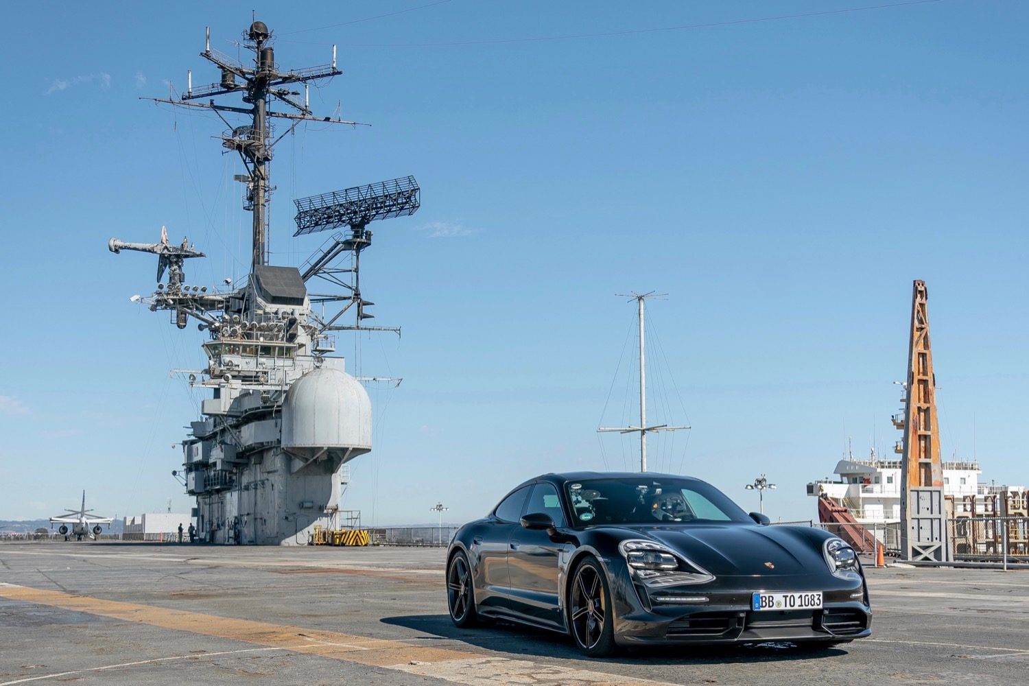porsche taycan electric car acceleration test on aircraft carrier deck prototype