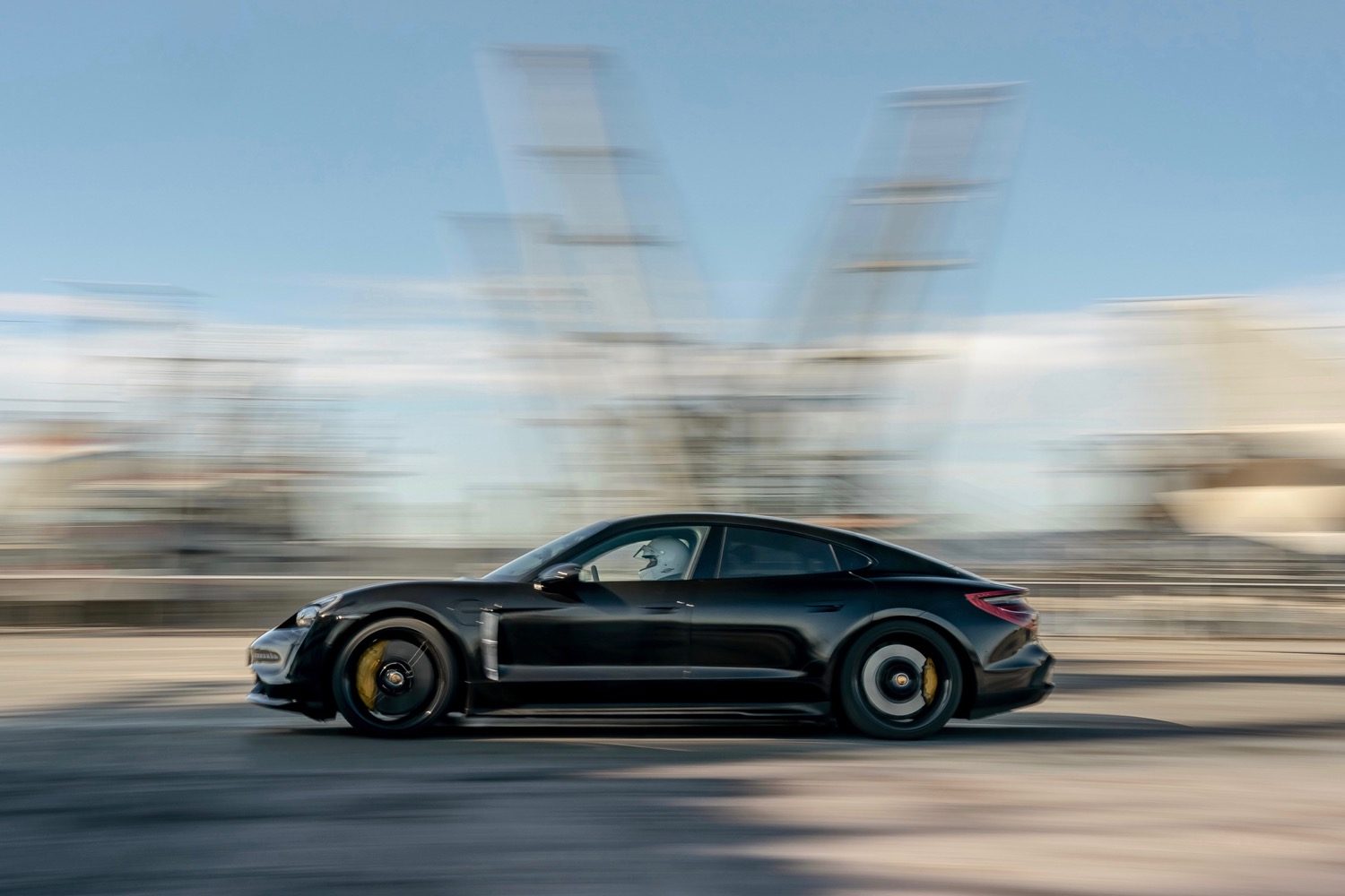porsche taycan electric car acceleration test on aircraft carrier deck prototype