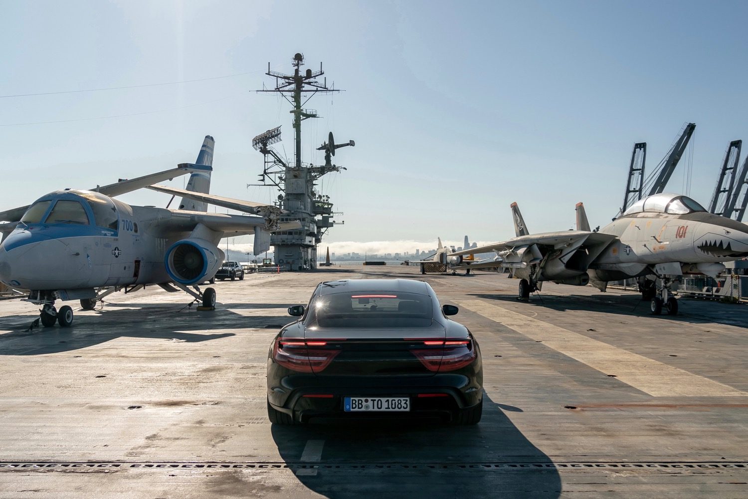porsche taycan electric car acceleration test on aircraft carrier deck prototype