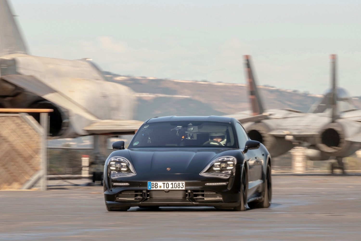 porsche taycan electric car acceleration test on aircraft carrier deck prototype