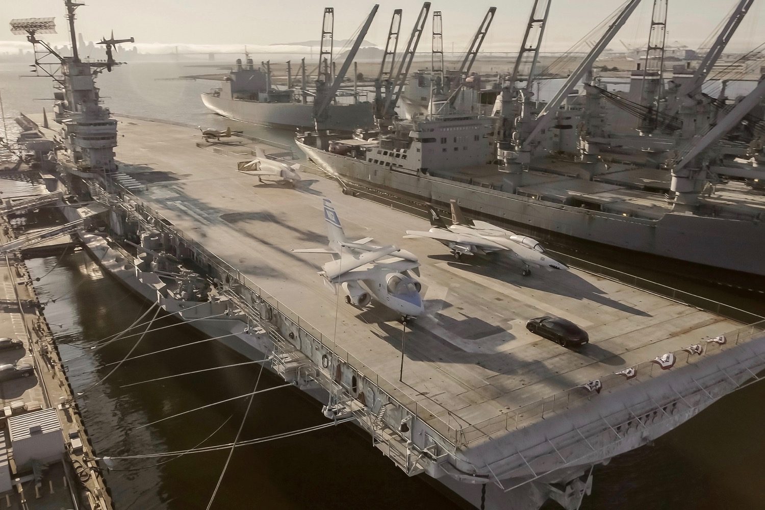 porsche taycan electric car acceleration test on aircraft carrier deck prototype