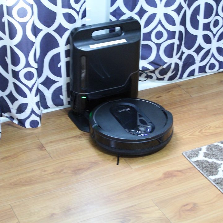 SharkIQ robot vacuum docked in its base.
