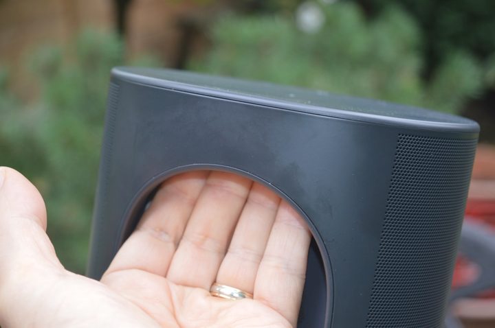 Holding the Sonos Move by the handle