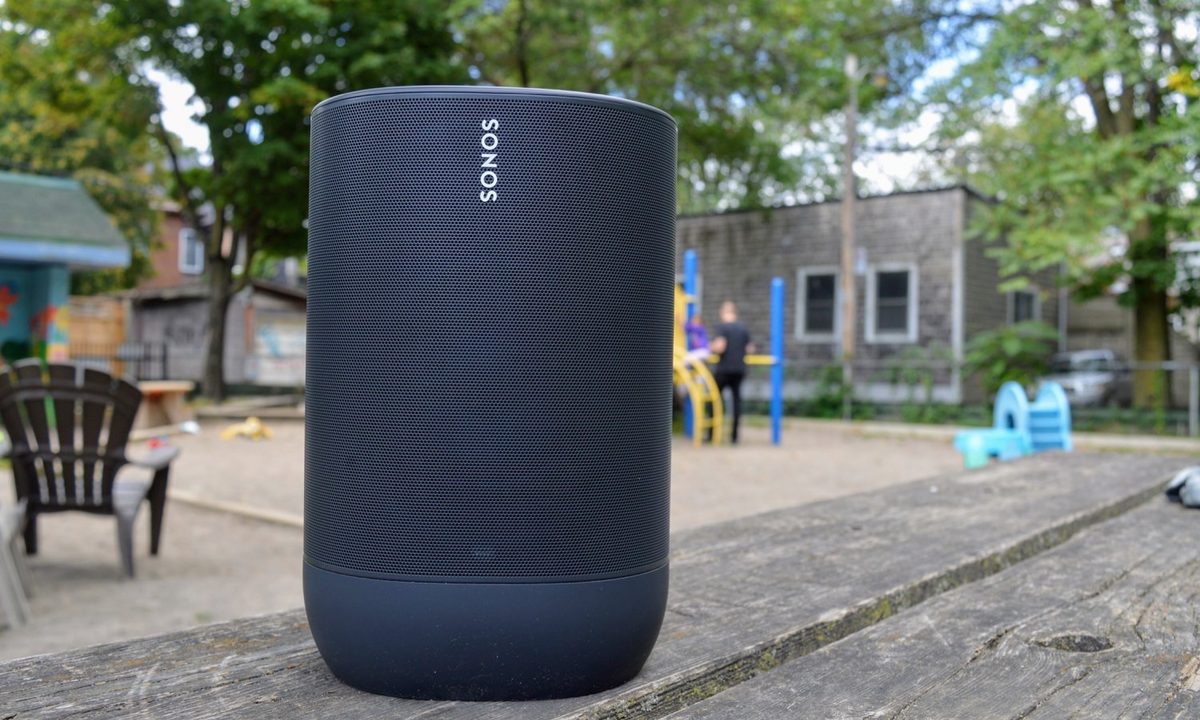 Sonos Move outdoors on a picnic bench.