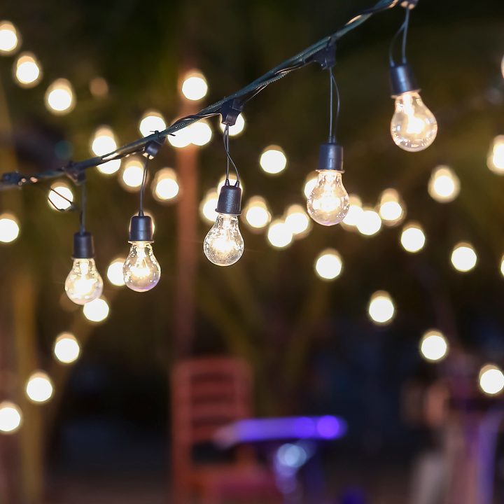 AOP Outdoor String Lights in a yard.