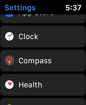 WatchOS 6's menu with Clock, Compass, and Health visible.