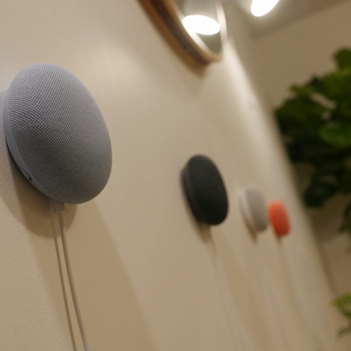 Several Nest Minis mounted at different spots on a wall.