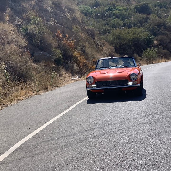 Electric GT Fiat 124 driving