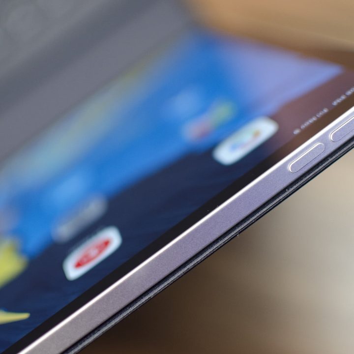 A closeup of an iPad sitting on a table.