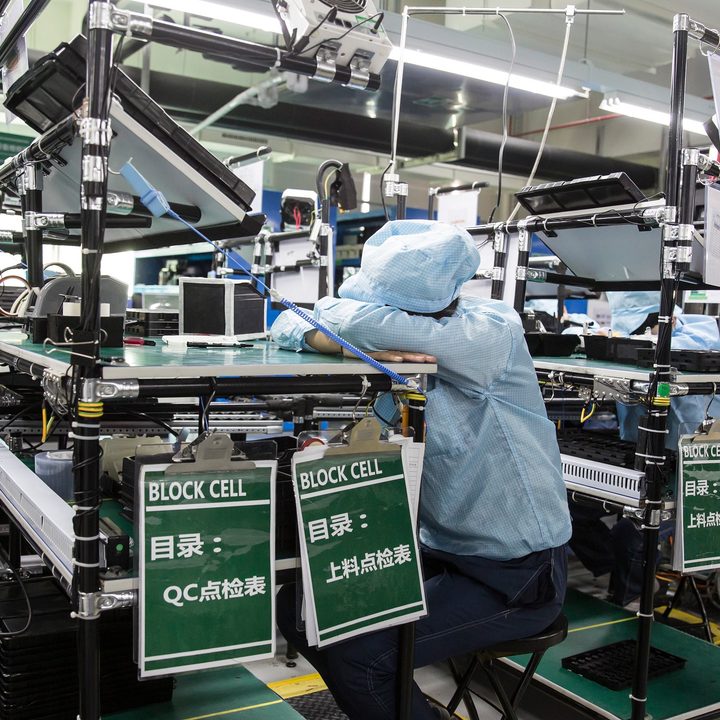 Factory workers on an assembly line.