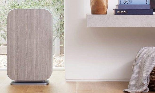 The Breathesmart air purifier on a living room floor.