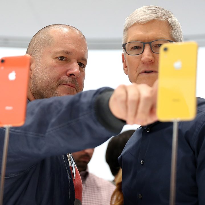 Apple chief design officer Jony Ive (L) and Apple CEO Tim Cook inspect the new iPhone XR